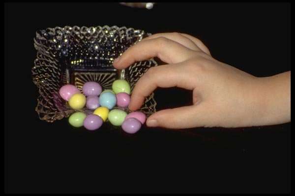 025084 Hand At Candy Dish A4 Photo Print
