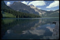 026051 Canoers Coming To Shore A4 Photo Print