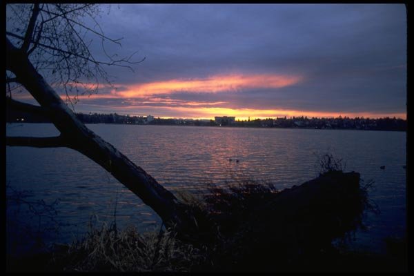 026062 Sunset Over Lake And City A4 Photo Print