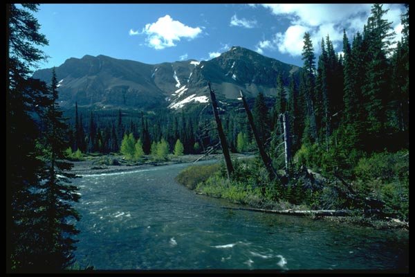 026077 River, Mountain And White Clouds A4 Photo Print