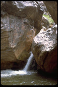 027001 Small Waterfall Between Painted Rocks A4 Photo Print