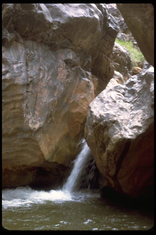 027001 Small Waterfall Between Painted Rocks A4 Photo Print