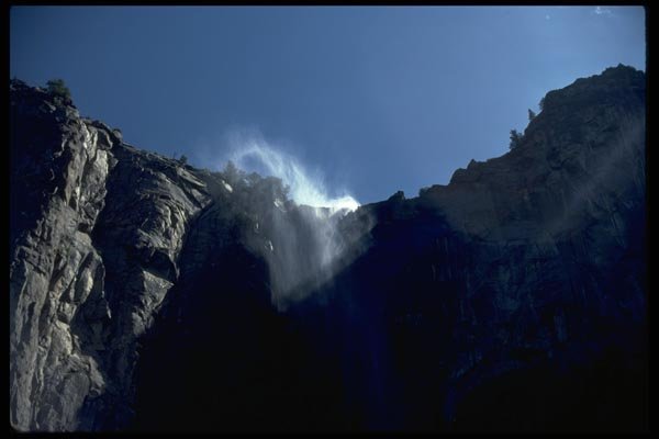 027009 Misty Waterfall On Sheer Cliff A4 Photo Print