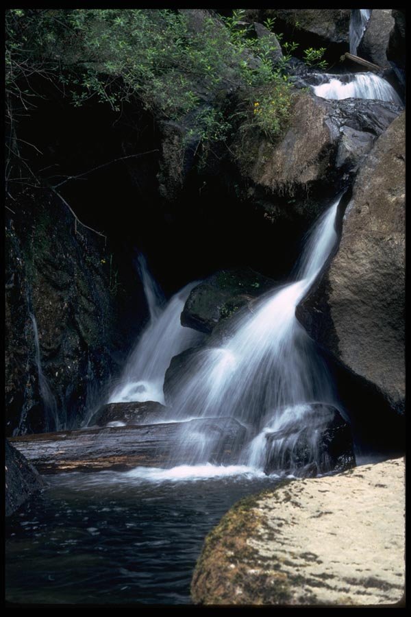 027013 Waterfall Between Rocks A4 Photo Print