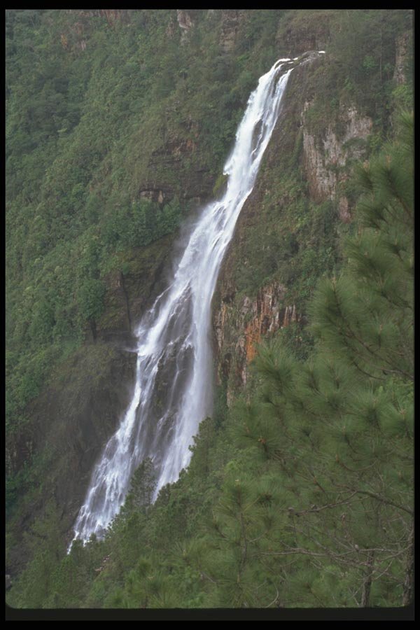 027036 Waterfall Down Side Of Mountain A4 Photo Print