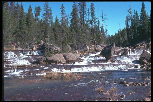 027045 Wide River Gradually Falling A4 Photo Print