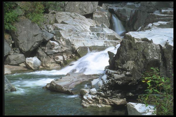 027061 Waterfall Winding Through Rocks A4 Photo Print