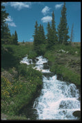 027064 Waterfall Cascading Through Meadow A4 Photo Print