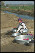 030048 Woman Washing Pans, Mazghuna A4 Photo Print
