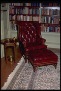 031015 Red Leather Chair And Ottoman In Den A4 Photo Print