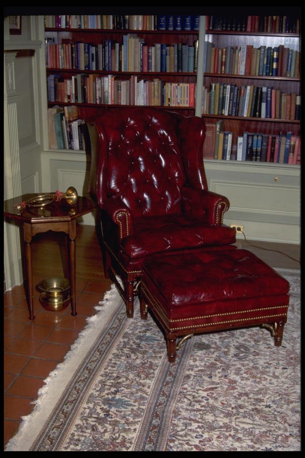 031015 Red Leather Chair And Ottoman In Den A4 Photo Print
