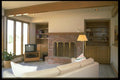031067 TV Room With Brick Fireplace, Bookshelves A4 Photo Print
