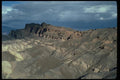 032007 Eroded Hills Under Dark Clouds A4 Photo Print
