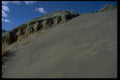 032093 Green Topped Rock Near Sand Dune A4 Photo Print