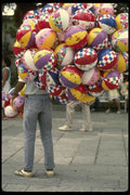 053067 Beach Ball Salesman A4 Photo Print