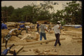 055045 Workmen Building A Traditional Building A4 Photo Print