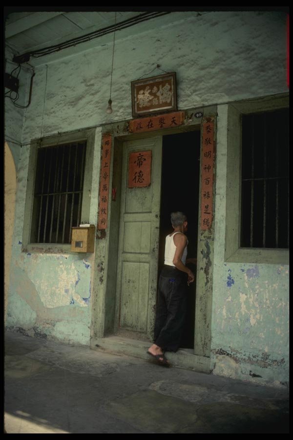 057028 Merchant Stall And House A4 Photo Print