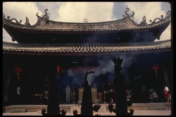 057054 Temple Exterior With Burning Joss Sticks A4 Photo Print