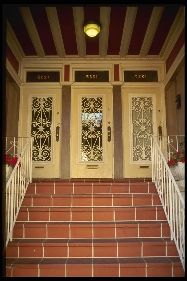 059087 Three Doors With Wrought Iron A4 Photo Print