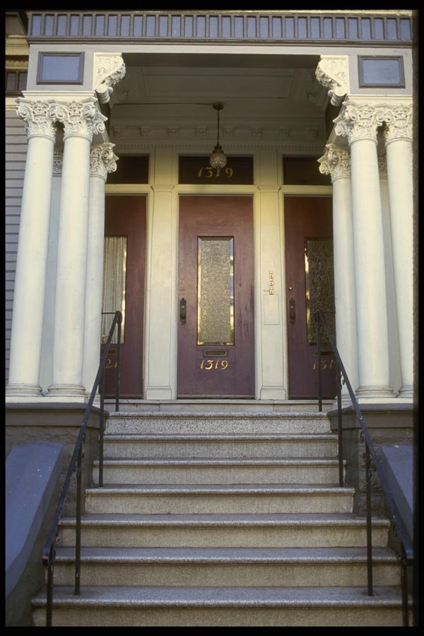 059089 Three Doors And Composite Columns A4 Photo Print