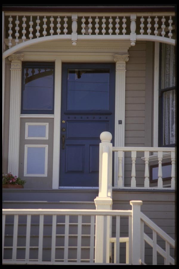 059093 Railings, Gingerbread And A Blue Door A4 Photo Print