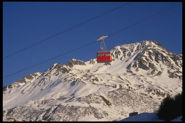 060073 Red Cablecar Andermatt Gemsstock A4 Photo Print