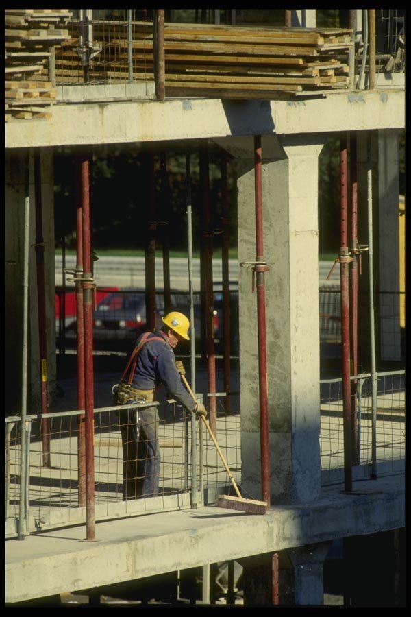 063023 Construction Worker Sweeping Cement Floors A4 Photo Print