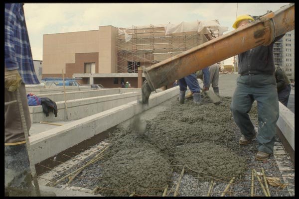 063058 Pouring Cement In Wire Mesh A4 Photo Print