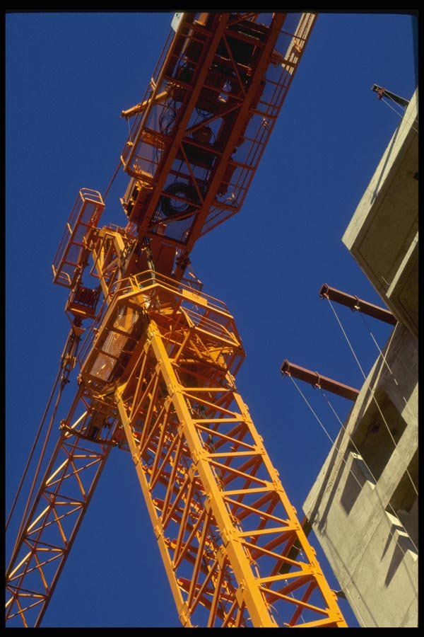 063061 Orange Crane, Blue Sky And Cement Building A4 Photo Print