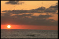 064035 Fisherman Returning, Orange Sunset, Puerto Vallarta A4 Photo Print