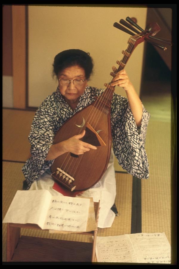065074 Playing The Five string Biwa A4 Photo Print