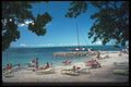 068047 Sunbathers Near Negril, Jamaica A4 Photo Print