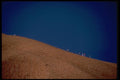 069052 Climbers On The Skyline Ayers Rock, Northern Territory A4 Photo Print