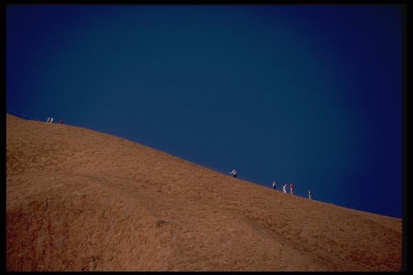 069052 Climbers On The Skyline Ayers Rock, Northern Territory A4 Photo Print