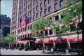 074055 Madison Avenue Store Front With Flags A4 Photo Print