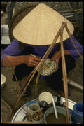 076007 Eating Noodles Under Cone shaped Hat A4 Photo Print