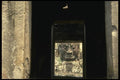 076015 Stone Face Framed In Doorway A4 Photo Print