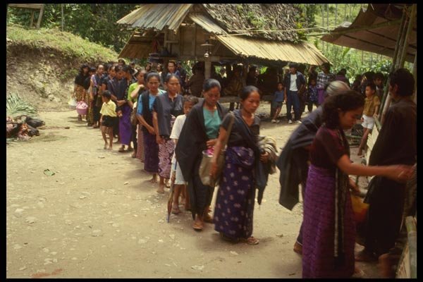 076017 Procession Of Colorfully Dressed Women A4 Photo Print