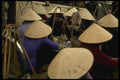 076033 People Squatting Wearing Cone shaped Hats A4 Photo Print