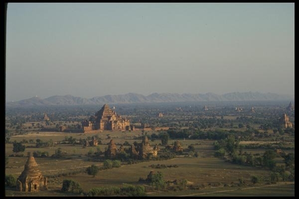 076080 Plain Temples, Mountain Backdrop A4 Photo Print