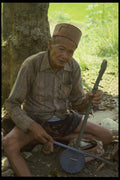 076088 Old Man Playing Instrument A4 Photo Print