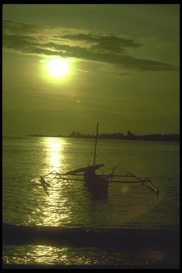 083070 Outrigger Fishing Boat At Sunset A4 Photo Print