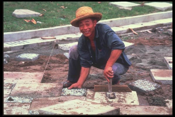 085048 Man Fitting Paving Stones A4 Photo Print