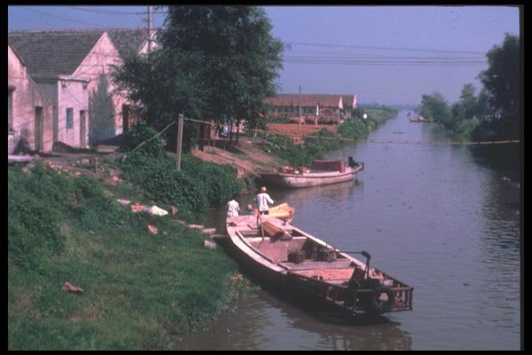 085063 Boat On Shore, Near Shanghai A4 Photo Print