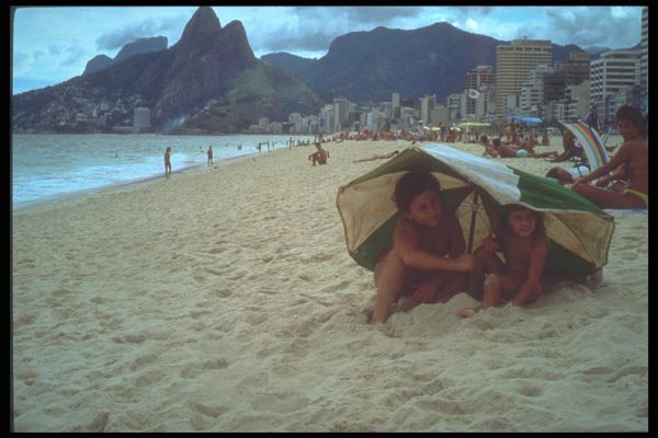 093029 Children Taking Shelter On Ipanema Beach A4 Photo Print