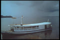 093030 Small Cargo Boat Waiting Out Oncoming Storm A4 Photo Print
