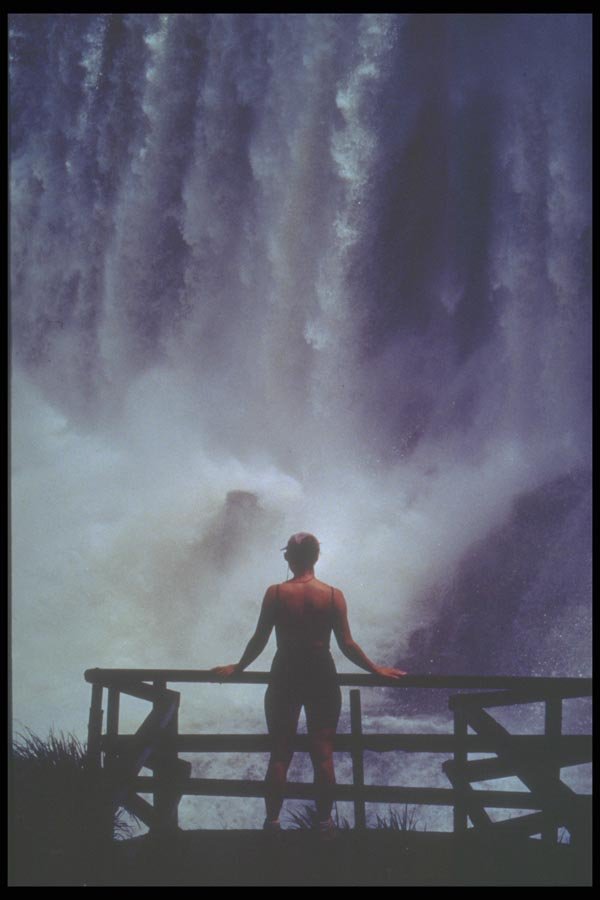 093046 Woman Standing By Foz Do Iguacu A4 Photo Print