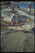 093054 Fisherman Mending Nets On Promenade In Ubatuba A4 Photo Print