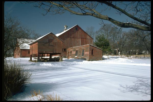 097034 Old Red Barns In Winter A4 Photo Print