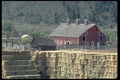 097041 Stacked Hay And Red Barn A4 Photo Print